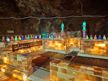 Illuminated salt mosque chamber inside Khewra Salt Mine
